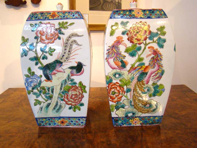 Beautiful pair of Chinese covered vases in the exotic bird motif, 20th century.